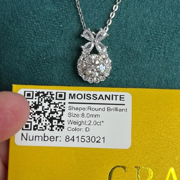 Dazzling Silver Moissanite 2ctw Center Pendant Necklace with Bow Accent - Picture 4 of 4